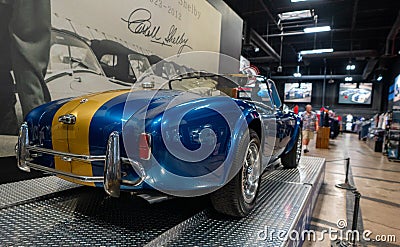An original AC Cobra and ford mustang gt in the Carroll Shelby Heritage Center Editorial Stock Photo