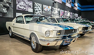 An original AC Cobra and ford mustang gt in the Carroll Shelby Heritage Center Editorial Stock Photo
