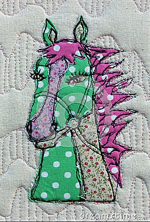 Original applique made of fabric and thread. Stock Photo