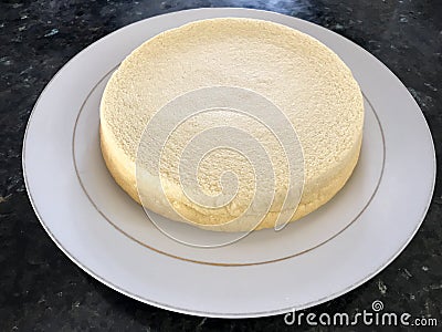 The original cake is in the plate. Stock Photo