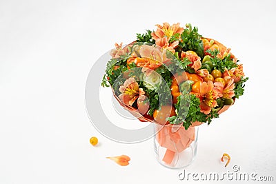 Original gift in the form of a bouquet of ripe vegetables on a white background Stock Photo