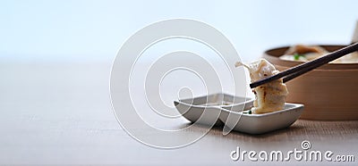 Original Japanese dumplings gyoza with soy sauce on wooden table. Stock Photo