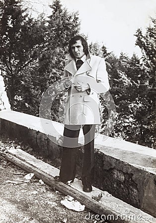 Original 1970 photo, vintage italian man outdoor. Fashion clothing. Stock Photo