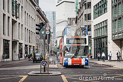 The Original Tour bus painted as Union Jack on a street in the City of London, UK. Editorial Stock Photo
