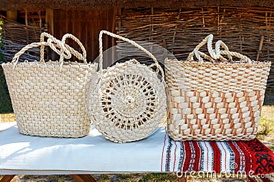 Original woven handbags from natural dried corn leaves Stock Photo