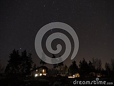 Orion constellation and open cluster Pleiades on night sky Stock Photo