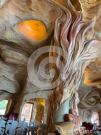 A decorative post of a woman underwater at the Mythos Restaurant at Universal Studios in Orlando, Florida Editorial Stock Photo