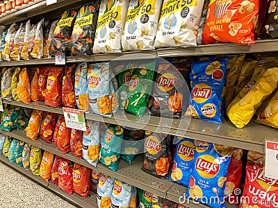 A display of Lays potato chips on a display shelf of a Publix Grocery Store Editorial Stock Photo