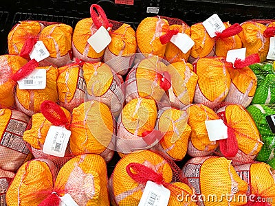 A display of frozen turkeys in the refrigerated meat aisle of a Sams Club grocery store Editorial Stock Photo