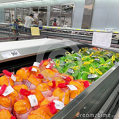 A display of frozen turkeys in the refrigerated meat aisle of a Sams Club grocery store Editorial Stock Photo