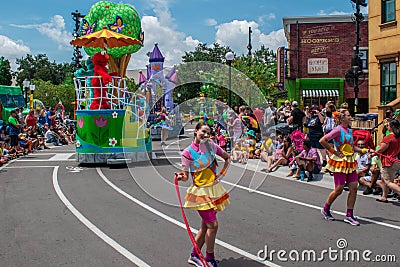 Colorful woman dancers in Sesame Street Party Parade at Seaworld Editorial Stock Photo