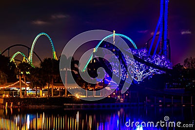 Colorful tree iluminated and rollercoasters at Seaworld 402 Editorial Stock Photo