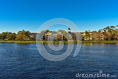 Colorful Victorian style Hotel on blue sky background at Lake Buena Vista area. Editorial Stock Photo