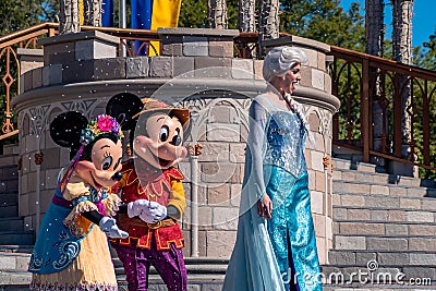 Mickey, Minnie and Elsa in Mickeys Royal Friendship Faire in Magic Kingdom 46. Editorial Stock Photo