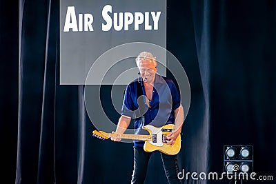 Graham Russell from air supply, singing beautiful melody at Epcot in Walt Disney World 4 Editorial Stock Photo