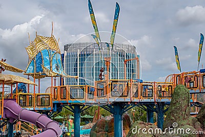 Partial view of Cabana Bay Hotel and colorful water attractions at Volcano Bay water park. Editorial Stock Photo