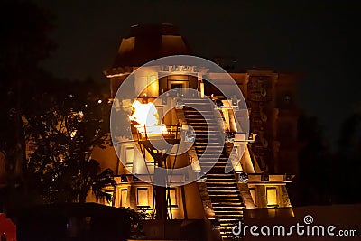 Mexican Pyramid and giant fire torch at Epcot. Editorial Stock Photo