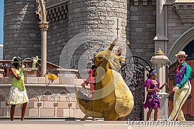 Mickey and Minnie dancing with The princess and the frog characters in Magic Kingdom 1 Editorial Stock Photo