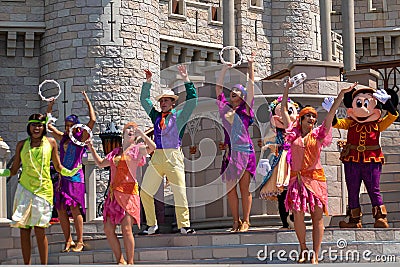 Mickey and Minnie dancing with The princess and the frog characters in Magic Kingdom 4 Editorial Stock Photo