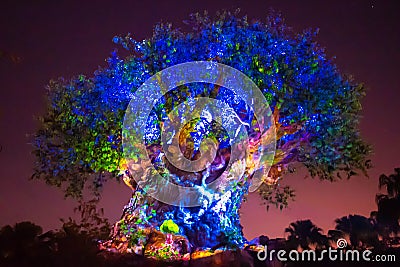 Panoramic view of Illuminated Tree of Life on blue night background at Animal Kingdom in Walt Disney World area 1 Editorial Stock Photo