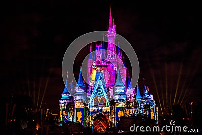 Illuminated and colorful Cinderella Castle in One Upon a Time Show at Magic Kingdom 53. Editorial Stock Photo