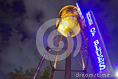 Illuminated Tower and sign of House of Blues at night in Lake Buena Vista. Editorial Stock Photo