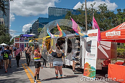 Colorful stands in Come Out With Pride Orlando parade at Lake Eola Park area 149 Editorial Stock Photo