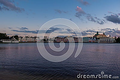 Lovely victorian ride on dockside and charming colorful buildings at Lake Buena Vista Editorial Stock Photo