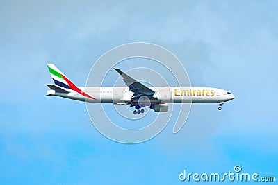 Airplane from Emirates Airlines, is landing at Orlando Airport .The background of the image ma Editorial Stock Photo