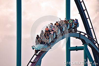 Amazing Mako Roller Coaster Roller coaster with funny riders, at Seaworld Theme Park. Editorial Stock Photo