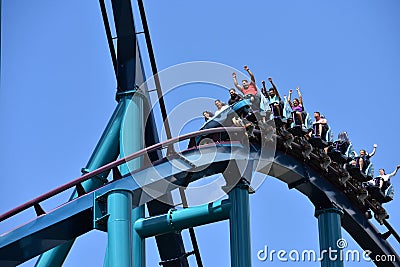 Funny people enjoying Mako Rollercoaster at Seaworld Marine Theme Park. Editorial Stock Photo