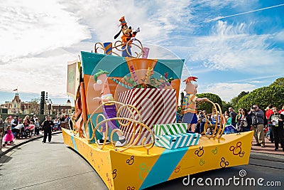 Disney main character Goofy Surprise Celebration parade on Main Street in Magic Kingdom at Walt Disney World. Editorial Stock Photo