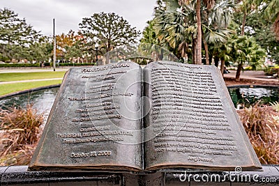 ORLANDO, FLORIDA, USA - DECEMBER, 2018: Sculpture of a book with the beautiful story of the Fantasy Swan at Eola Park, Downtown Editorial Stock Photo