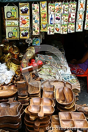 Ornamental and decorative ceramic tiles and wood trays and plates sold at a store in Dapitan Arcade in Manila, Philippines Editorial Stock Photo