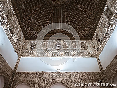 Ornamental wood and stone carvings in the interior of the Real Alcazar de Seville Editorial Stock Photo