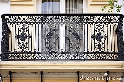 an ornamental wrought ironwork of a classic balcony Stock Photo