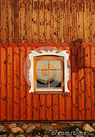 Ornamented rustic window Stock Photo