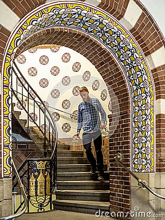 Ornate arch opening to a spiral stairwell Editorial Stock Photo