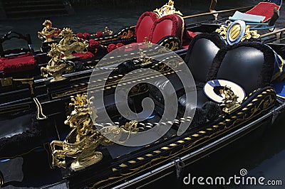 Ornate Black and Red Venetian Gondolas Venice Italy Stock Photo