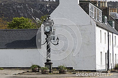 Ornate black and white clock on as street corner Editorial Stock Photo