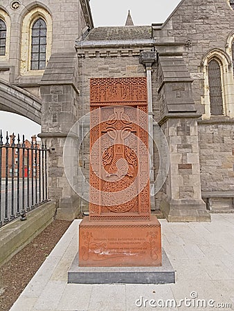 Ornate celtic cross carved in stone, Dublin Editorial Stock Photo