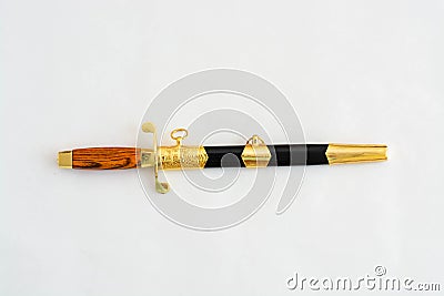 Ornate ceremonial dagger next to a jeweled scabbard Stock Photo