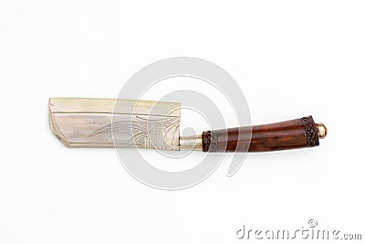 Ornate ceremonial dagger next to a jeweled scabbard Stock Photo