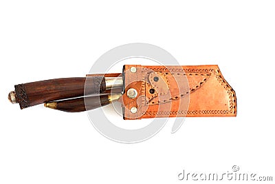 Ornate ceremonial dagger next to a jeweled scabbard Stock Photo