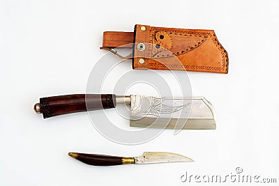 Ornate ceremonial dagger next to a jeweled scabbard Stock Photo