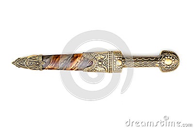 Ornate ceremonial dagger next to a jeweled scabbard Stock Photo