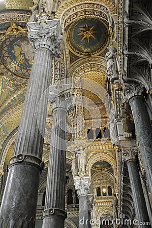 Ornate columns on the interior of the Basilica Notre-Dame de Fourviere, Lyon Editorial Stock Photo
