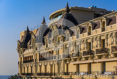Ornate exterior of the famous Hotel de Paris in Monte Carlo Monaco, regularly listed on Conde Nast Traveler Gold List Editorial Stock Photo