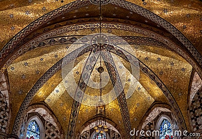 Ornate gilded restored interior of Fitzrovia Chapel at Pearson Square in London W1, UK. Stock Photo
