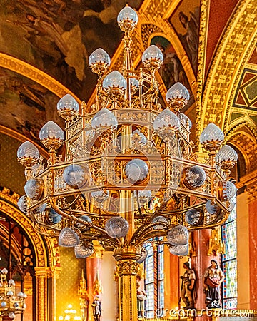 Ornate gold chandelier in the Parliament Building of Budapest, Hungary Editorial Stock Photo